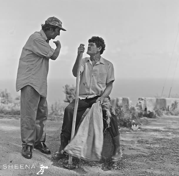 Wilson Norris talking to Wilson Yearwood.jpg - Wilson Norris is about to go and collect coconuts